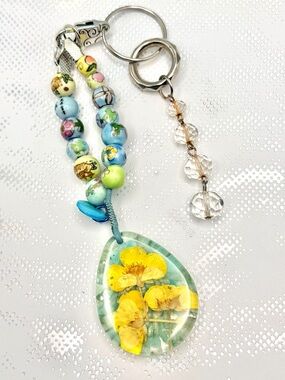 Handmade Resin Teardrop Keychain with Pressed Yellow Flowers and Beaded Strap